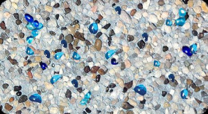Photo of aggregate luxury pool finish from Pebble Tec.